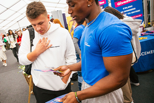 a student talking with a client