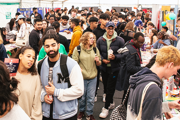 a crowd of students at scotieties fair