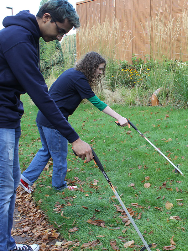 a picture of students litter picking