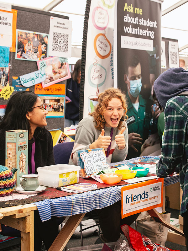 a picture of a volunteering group at societies fair