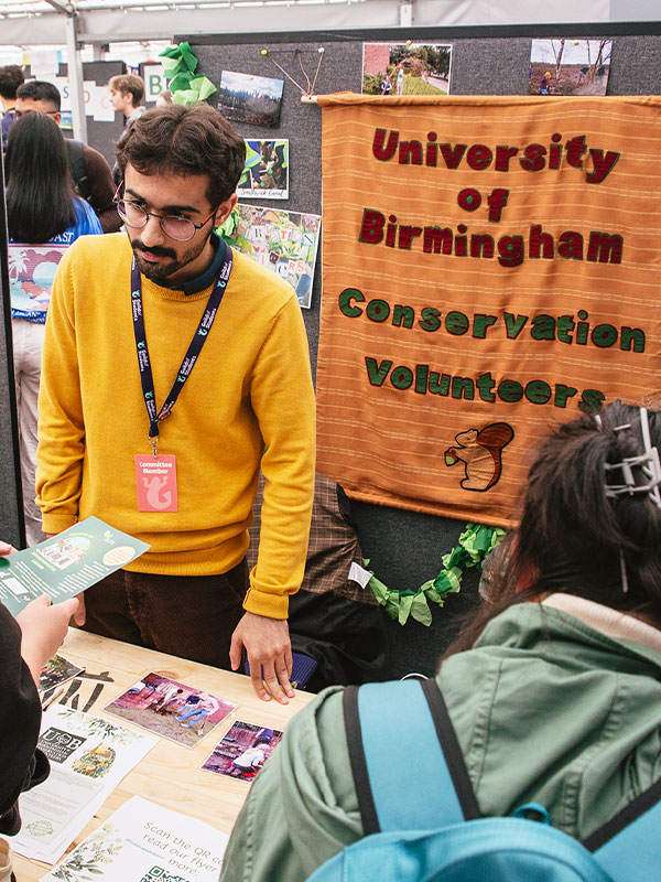 a picture of a volunteering group at societies fair